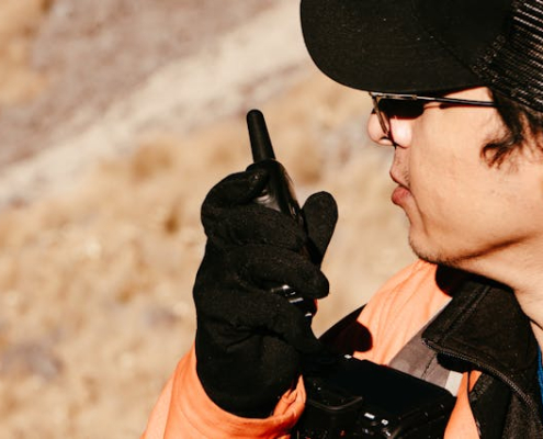 a man using a two-way radio for communication