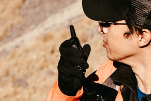 A man utilising a two-way radio